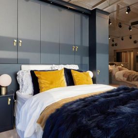 Midnight Blue Overbed Storage and Fitted Wardrobes