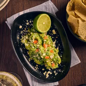 Craving bold flavors? Rio on Wazee in Downtown Denver serves up one of the best Tex-Mex dishes around—starting with their famous guacamole. A must-try staple of Denver Mexican food, perfect with house-made tortilla chips!