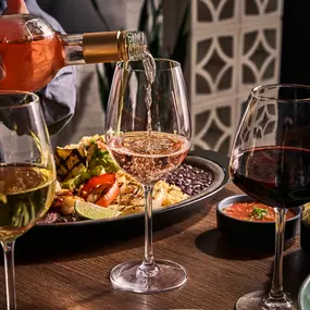 It’s 5 o’clock somewhere, why not make it special?
Unwind with a glass of wine and a delicious meal that brings out the best in both. Our curated wine list features our favorite selections, each chosen to perfectly complement the flavors on your plate. Whether you’re celebrating or just relaxing, the perfect pairing awaits.