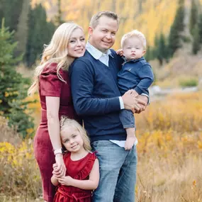 Dr. Tysen Carter with kids at Office