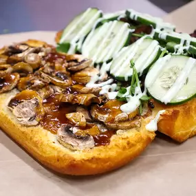 Sesame Beef Steak, Mushrooms, Cilantro, Crispy Cucumbers & Topped with a Refreshing Cucumber Wasabi Dressing.