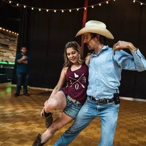 Country Swing dance lessons at Scootin' Boots Dance Hall