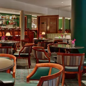 Bar and dining room in the Polo Lounge at The Beverly Hills Hotel