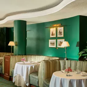 Interior dining room of the iconic Polo Lounge in The Beverly Hills Hotel