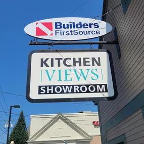 New Builders FirstSource signage with Kitchen Views sign at Warwick, RI location.