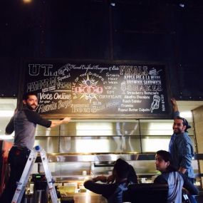 Adding the final touches at the University Draft House!