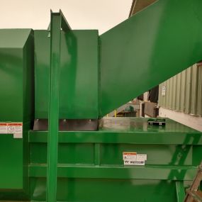 Self-Contained Trash Compactor with Through-the-Wall Chute