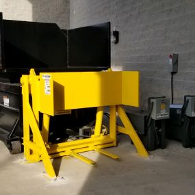 Self-contained Compactor with Hydraulic Dumper