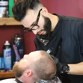 Looking to get a clean cut and shave? Book an appointment with us today!