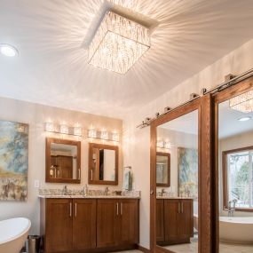 Beautiful Master Bathroom with Stand-Alone Tub and Double Sliding Doors
