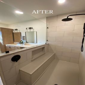 AFTER: Beautiful tile shower with niche and bench seat!