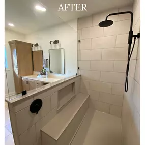 AFTER: Beautiful tile shower with niche and bench seat!