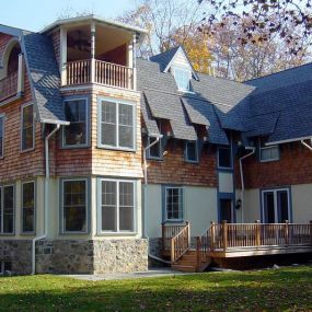 Victorian Addition Award Winner. Project includes 3rd floor in-law suite with an elevator. The main staircase was matched perfectly to continue to the top floor where a local artist created a beautiful fresco. Included in this project is a new kitchen, finished basement, and a spiral staircase.