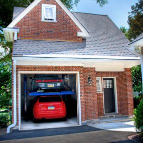 Unique double decker garage with two post car lift in Wayne, PA