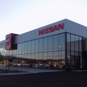 Russ Darrow Nissan of West Bend front of building.