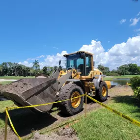 Earthwork crew starting sitework prep.