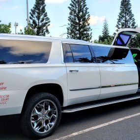 Super Limousine Service
Gullwing Cadillac escalade super limo