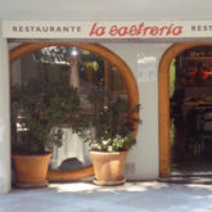 Logotyp från La Sastrería