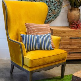 Fun and vibrant yellow accent chair.