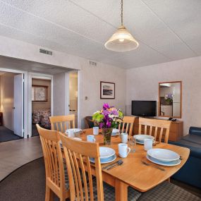 Living room and kitchen in guest room at Harbor Light Family Resort