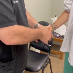 Dr. John Giovanelli doing Hand Chiropractic Adjustment