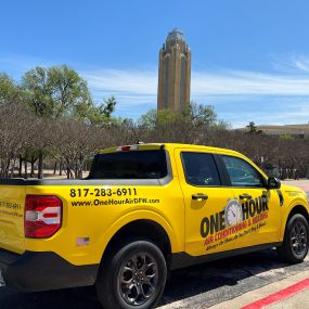 A One Hour Air Conditioning And Heating service truck near the Will Rogers Memorial Center in Fort Worth TX