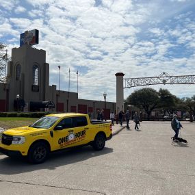 One of the One Hour Air of Fort Worth service vehicles outside of Billy Bobs at the Stockyards in Fort Worth TX