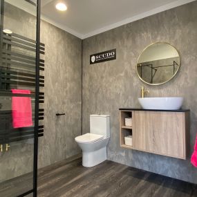 Shower room dipsplay with wall hung unit and wc