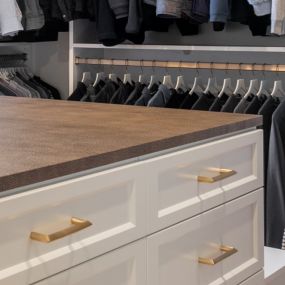 Wow factor alert! Leather countertops and drawer fronts in your closet!