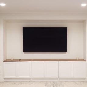 Entertainment center with floating shelves