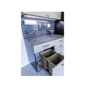 Conceal and contain effortlessly with our built-in trash cans, integrated into garage cabinets for a seamlessly clean and organized space.