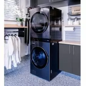 Yes, your laundry room can be in your garage, and it doesn't have to be an eyesore! Save space in your home and add a workspace so you can wash, fold, and organize with ease.