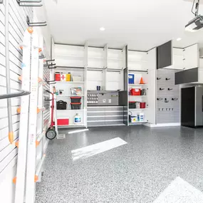 Who says your garage can’t be both stylish and organized? Here’s a garage that we upgraded with a beautiful monochrome color scheme and plenty of storage! Your garage could be next!