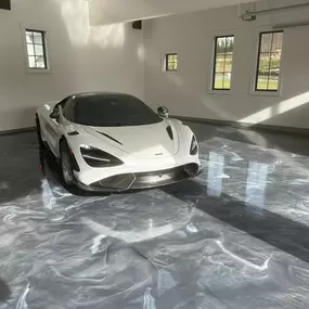 Sleek, bold, and built to impress! ✨ This Stratus flooring brings a high-gloss, marbled finish that makes any space stand out. Ready to bring this look to your home or garage?