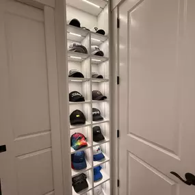 Maximize your space with style – custom LED-lit hat storage keeps your collection organized and on display. Perfect for any hat lover!