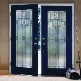 Patio door with decorative glass