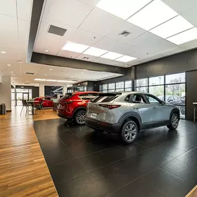 The team at Russ Darrow Mazda of Greenfield is here to help you find the perfect vehicle to fit both your needs and your budget. Visit us off HWY 100 today.