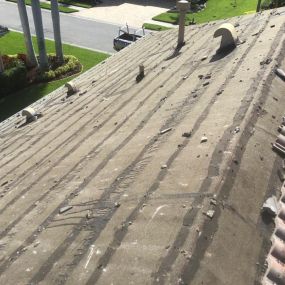 Tearing off a old tile roof
