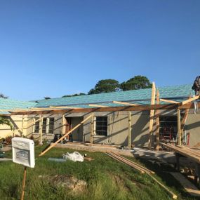 Adding a porch roof and completing a Kingdom Quality Standing Seam roof!
