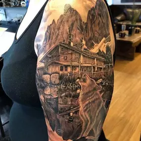 Cabin/wolf tattoo