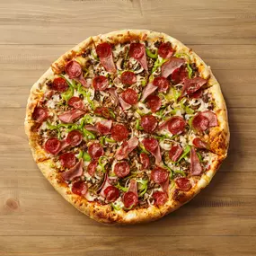 Johnny's New York Style Pizza - Loaded to the max! Sausage, onions, mushrooms, green peppers, beef, Canadian bacon & pepperoni.