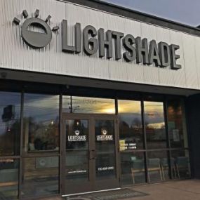 Building exterior of Lightshade recreational marijuana dispensary in Federal Heights, CO.