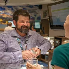 Lightshade Federal Heights Dispensary Budtender helping customer