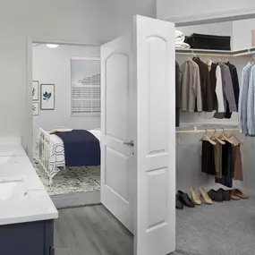 Large walk-in closet in bathroom with double sink vanity at Camden LaVina apartments in Orlando.