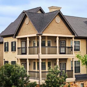 Building exterior showing wrap around balconies