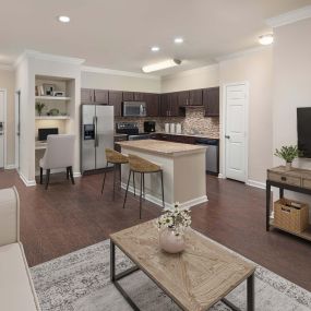 First floor home with wood-style flooring at Camden Riverwalk apartments in Grapevine, TX