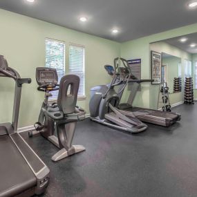 24-hour fitness center with cardio equipment