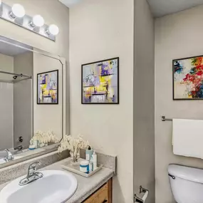 bathroom with bathtub with tile surround