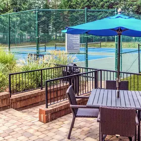 Onsite tennis courts and outdoor dining area