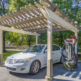 Car care center with industrial vacuum and hose